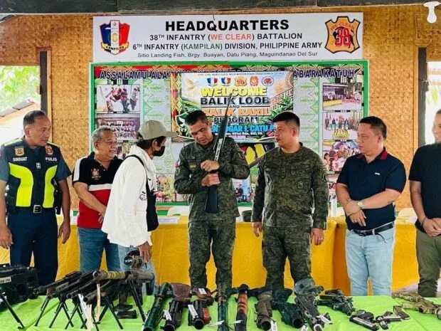 14 BIFF Members Surrender, Yield 39 Firearms in Maguindanao del Sur