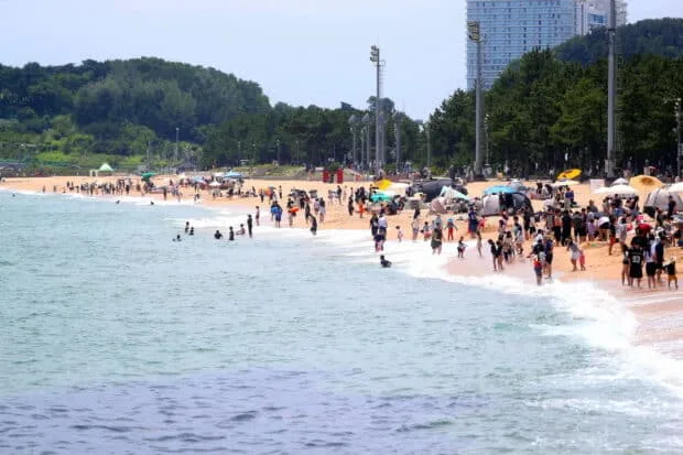 South Korea's Beaches Open for Summer Season, Welcoming Vacationers with Safety Measures